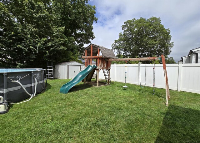 2189 Cedar Ave, Ronkonkoma, NY 11779 - view of playground featuring a fenced backyard and a shed