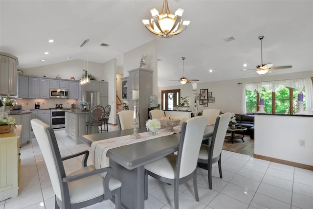 35 Lattintown Rd, Newburgh, NY 12550 - dining space featuring lofted ceiling, a ceiling fan, light tile patterned floors, recessed lighting, and a chandelier