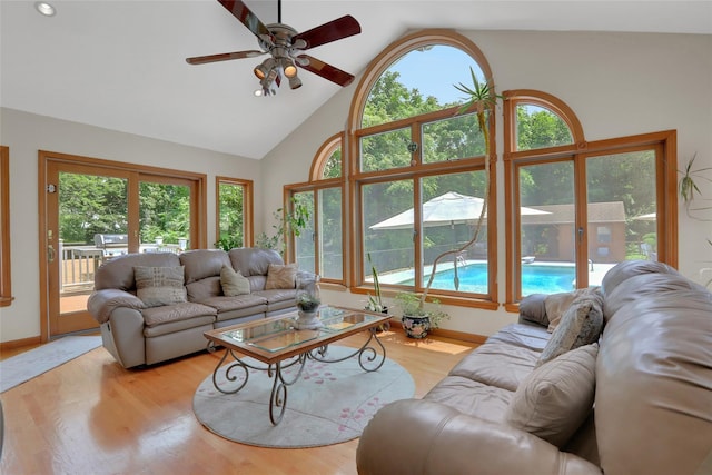 35 Lattintown Rd, Newburgh, NY 12550 - living area featuring plenty of natural light, ceiling fan, light wood-style floors, and high vaulted ceiling