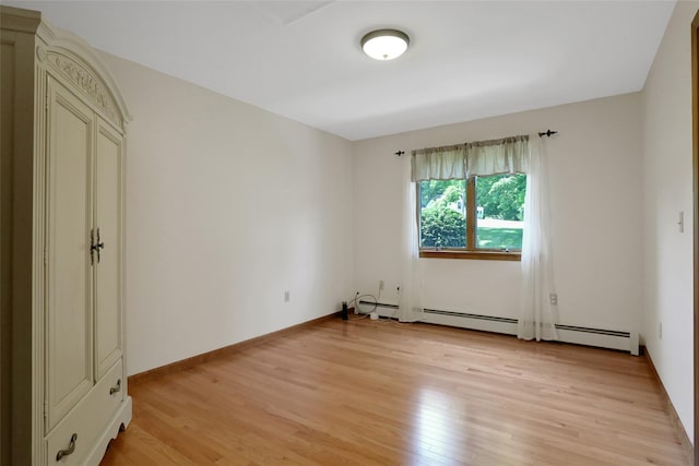 35 Lattintown Rd, Newburgh, NY 12550 - spare room with light wood-style flooring and baseboard heating