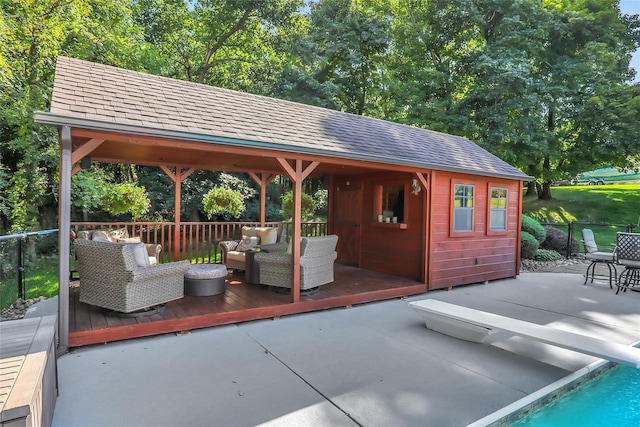 35 Lattintown Rd, Newburgh, NY 12550 - view of patio featuring an outbuilding, an outdoor living space, and a deck