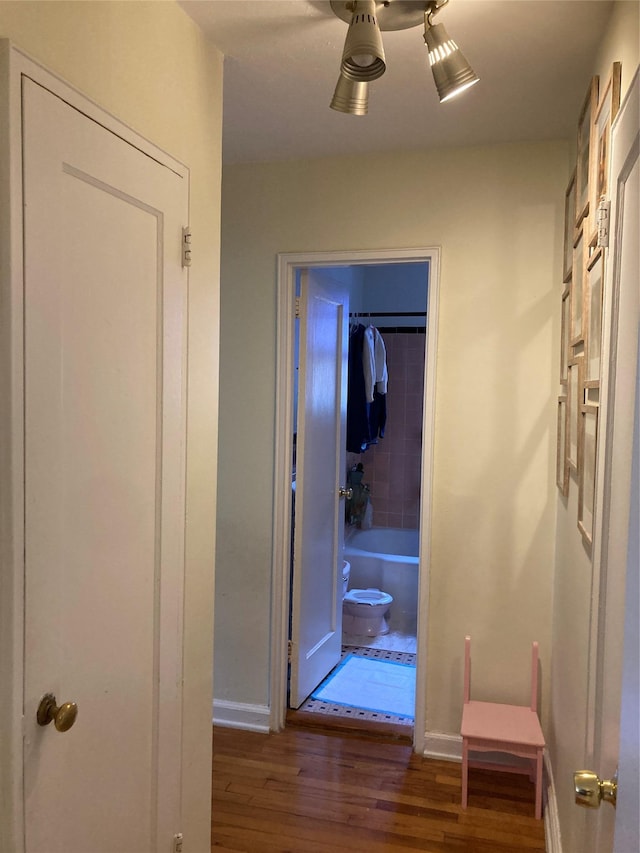 105-24 67th Ave Unit 4A, Forest Hills, NY 11375 - hall featuring wood finished floors and baseboards