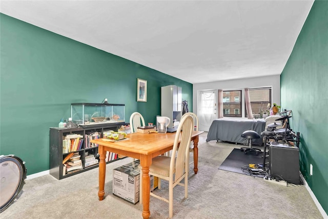 175 Archer St Unit 3A, Freeport, NY 11520 - dining space featuring carpet and an accent wall