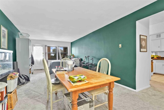 175 Archer St Unit 3A, Freeport, NY 11520 - dining area with light carpet and baseboards