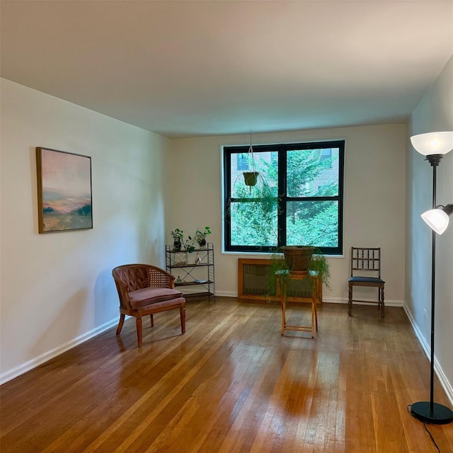83-20 98th St Unit 1H, Woodhaven, NY 11421 - sitting room featuring hardwood / wood-style flooring and baseboards
