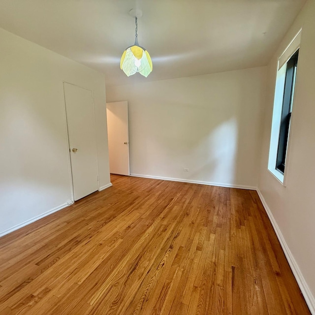 83-20 98th St Unit 1H, Woodhaven, NY 11421 - unfurnished room featuring light wood-style floors and baseboards