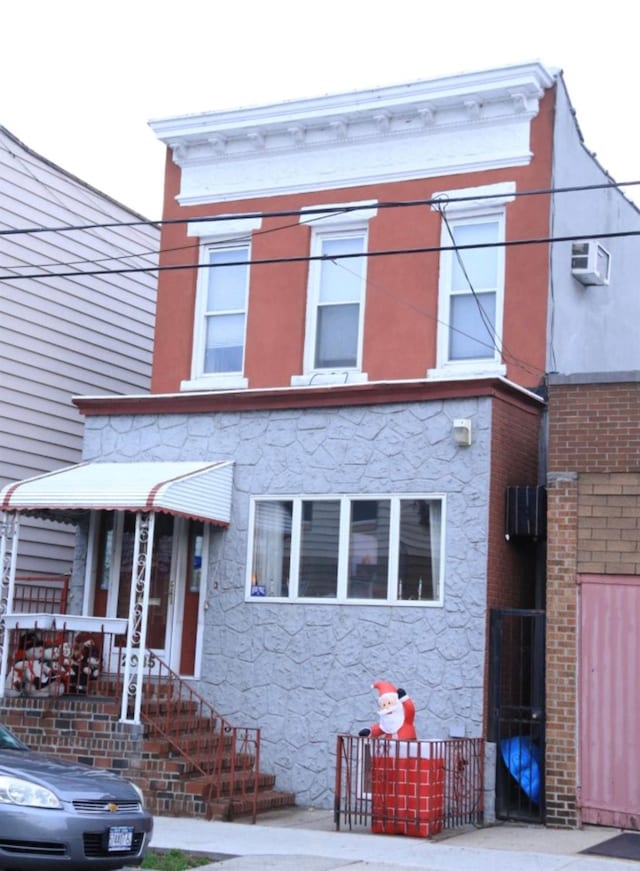 2035 Menahan St, Ridgewood, NY 11385 - view of front facade featuring stone siding