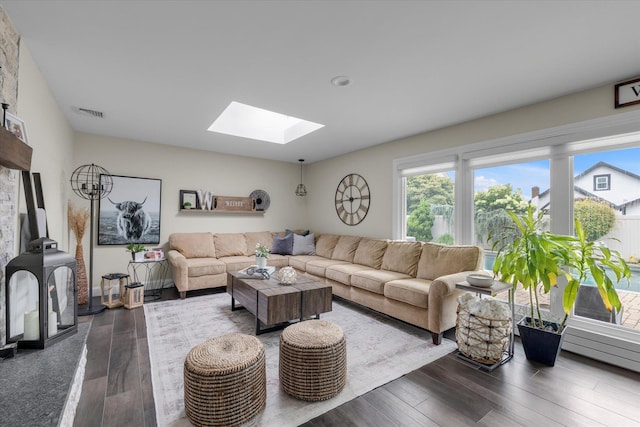 2854 Lenox Rd, Oceanside, NY 11572 - living room with a skylight and dark wood finished floors