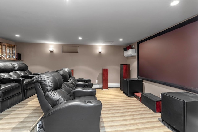 2854 Lenox Rd, Oceanside, NY 11572 - home theater featuring light carpet, recessed lighting, a wall mounted air conditioner, and baseboard heating