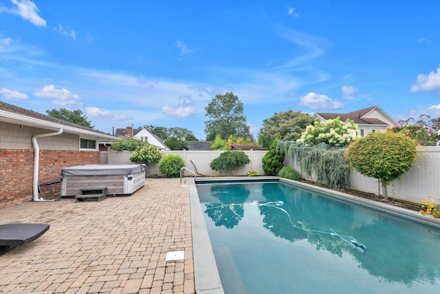 2854 Lenox Rd, Oceanside, NY 11572 - view of swimming pool featuring a hot tub, a fenced backyard, and a patio area