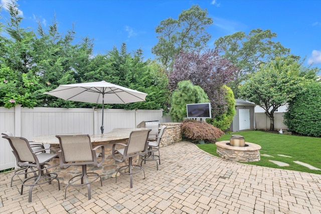 2854 Lenox Rd, Oceanside, NY 11572 - fenced backyard featuring a patio and an outdoor fire pit