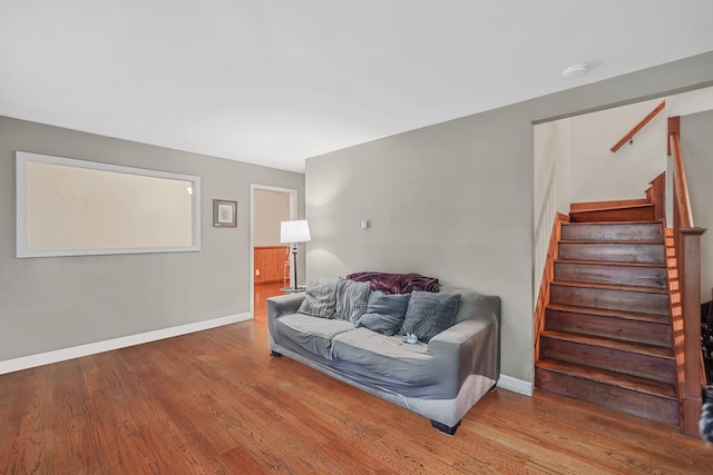 436 Oceanside St, Islip Terrace, NY 11752 - sitting room featuring wood finished floors and stairs