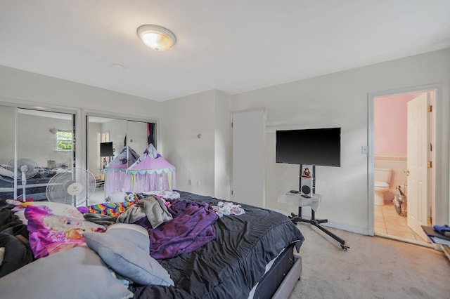 436 Oceanside St, Islip Terrace, NY 11752 - bedroom with carpet, two closets, and ensuite bathroom