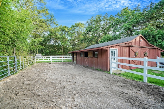 436 Oceanside St, Islip Terrace, NY 11752 - horse barn featuring view of wooded area