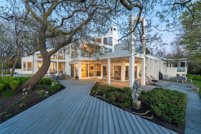 4105 Soundview Ave, Mattituck, NY 11952 - rear view of property featuring a patio and a wooden deck