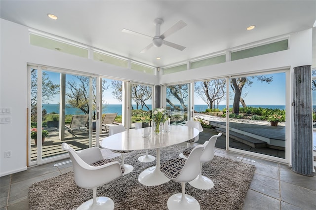 4105 Soundview Ave, Mattituck, NY 11952 - sunroom / solarium with a water view, stone tile flooring, and recessed lighting