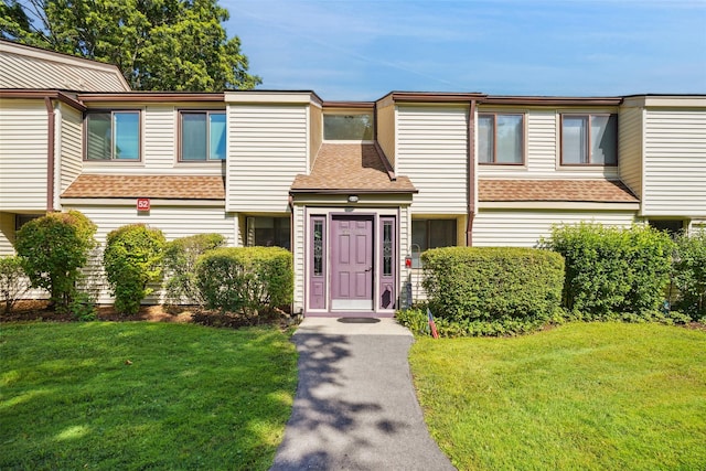 52 Jefferson Oval Unit E, Yorktown Heights, NY 10598 - multi unit property with a front lawn and a shingled roof