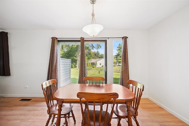 52 Jefferson Oval Unit E, Yorktown Heights, NY 10598 - dining space with baseboards and light wood-style floors