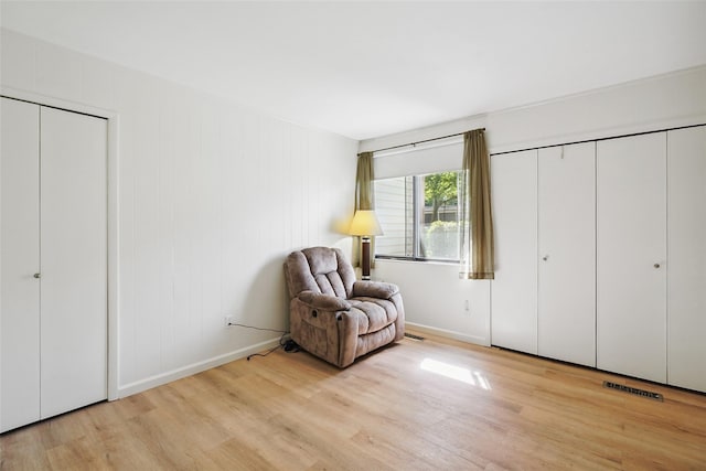 52 Jefferson Oval Unit E, Yorktown Heights, NY 10598 - sitting room featuring wood finished floors and baseboards
