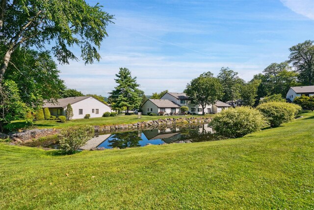 52 Jefferson Oval Unit E, Yorktown Heights, NY 10598 - view of green lawn featuring a water view