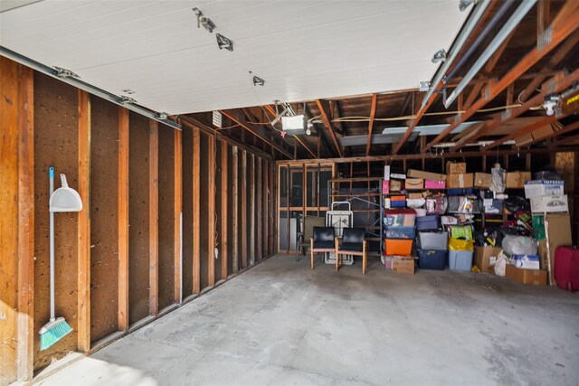 52 Jefferson Oval Unit E, Yorktown Heights, NY 10598 - garage featuring a garage door opener
