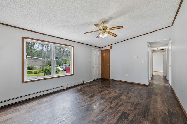 14 Cooper Dr, Nanuet, NY 10954 - empty room featuring attic access, a baseboard radiator, dark wood-style floors, crown molding, and a ceiling fan