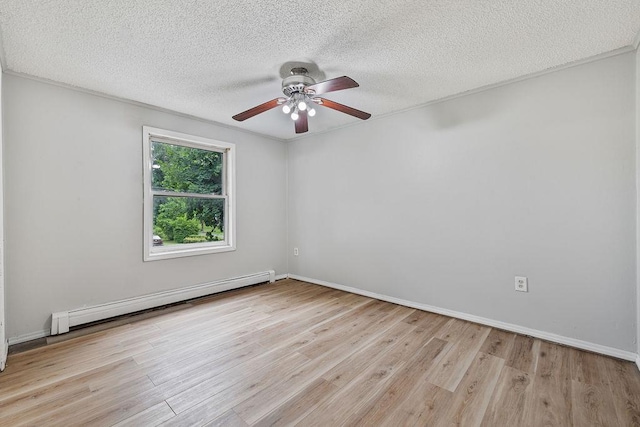 14 Cooper Dr, Nanuet, NY 10954 - unfurnished room with a baseboard radiator, a ceiling fan, light wood-type flooring, and a textured ceiling