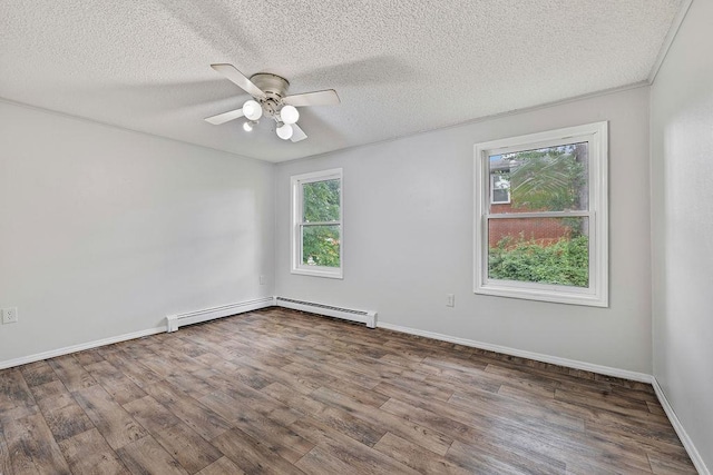 14 Cooper Dr, Nanuet, NY 10954 - unfurnished room with a baseboard radiator, wood finished floors, a textured ceiling, and ceiling fan