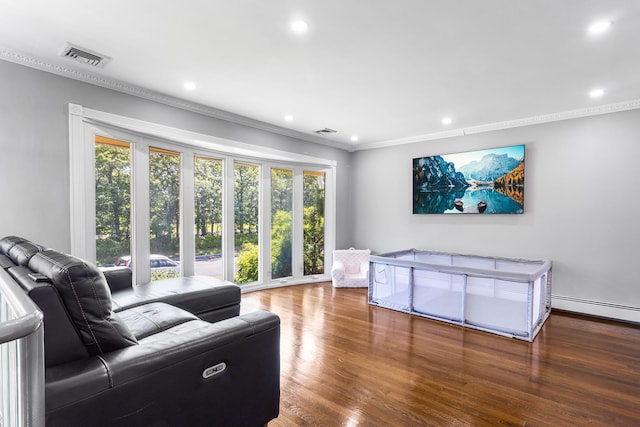 184 Overlook Dr, East Islip, NY 11730 - living room featuring crown molding, recessed lighting, wood finished floors, and a baseboard radiator