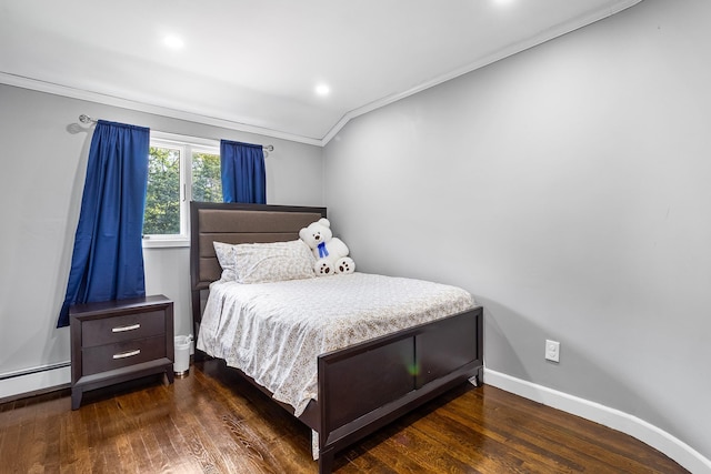 184 Overlook Dr, East Islip, NY 11730 - bedroom featuring ornamental molding, wood finished floors, lofted ceiling, baseboard heating, and recessed lighting