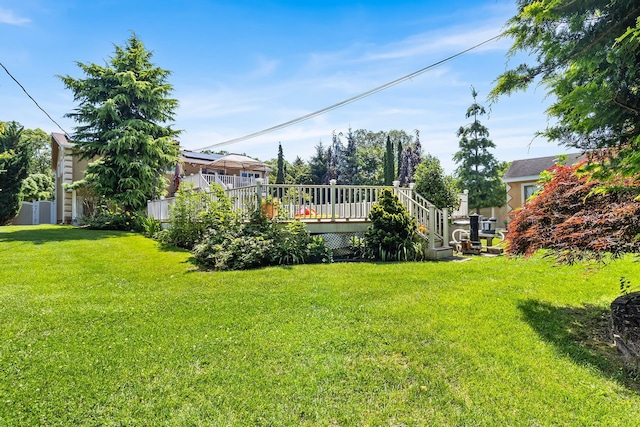 184 Overlook Dr, East Islip, NY 11730 - view of grassy yard with a deck