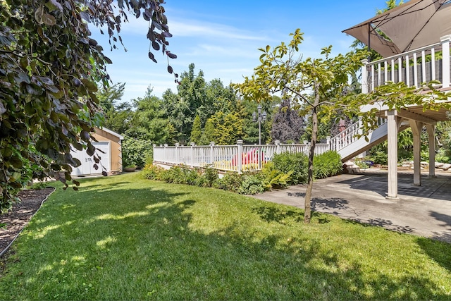 184 Overlook Dr, East Islip, NY 11730 - view of grassy yard featuring a patio