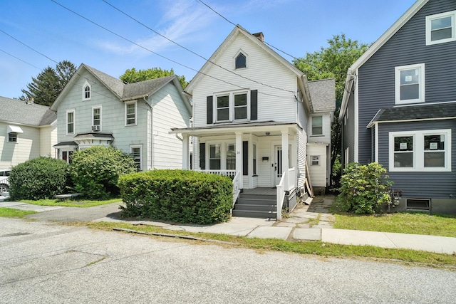 14 Washington Ave, Port Jervis, NY 12771 - view of front facade with a porch and a shingled roof