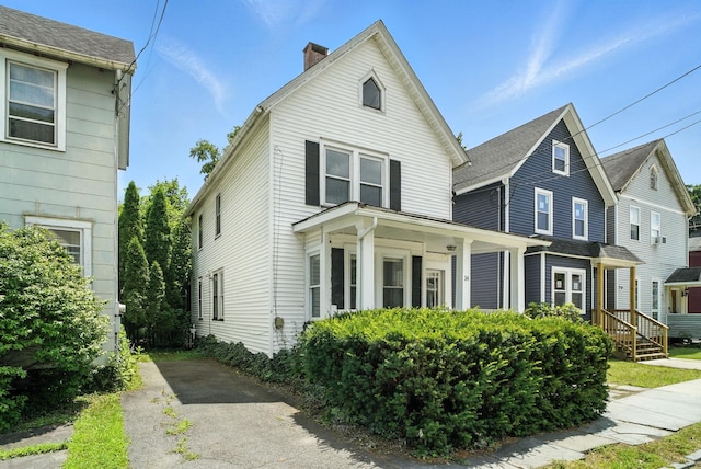 14 Washington Ave, Port Jervis, NY 12771 - view of front facade featuring a chimney