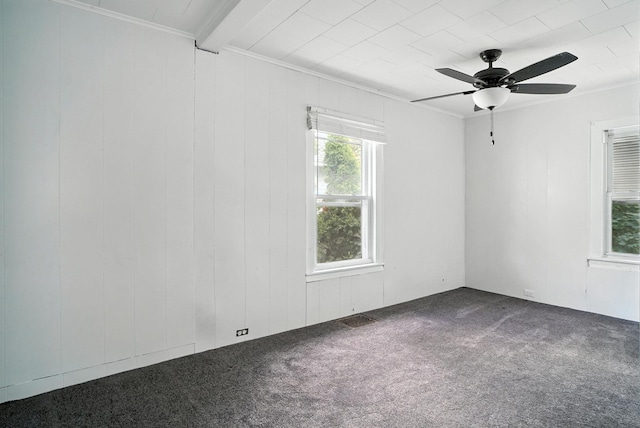 14 Washington Ave, Port Jervis, NY 12771 - empty room featuring dark carpet, ornamental molding, a ceiling fan, and beam ceiling