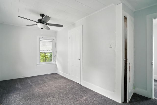 14 Washington Ave, Port Jervis, NY 12771 - empty room featuring dark colored carpet, ornamental molding, and a ceiling fan