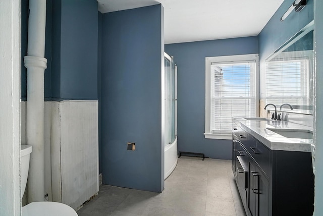 14 Washington Ave, Port Jervis, NY 12771 - full bathroom featuring double vanity and toilet