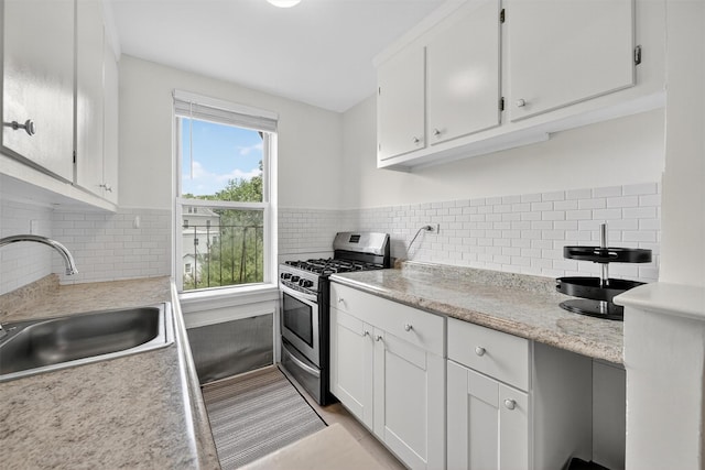 4295 Webster Ave Unit 5J, Bronx, NY 10470 - kitchen with gas stove, light countertops, and white cabinets