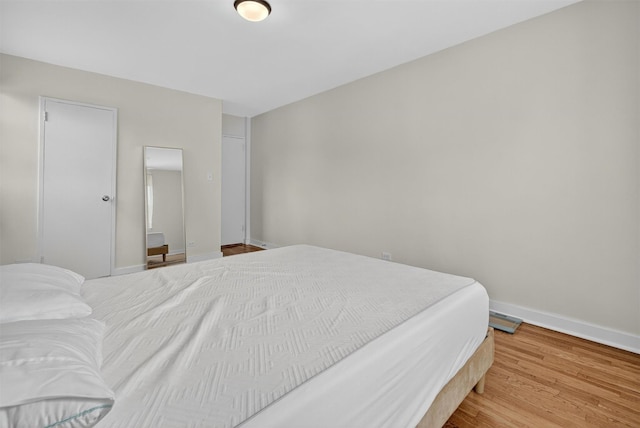 4295 Webster Ave Unit 5J, Bronx, NY 10470 - bedroom with baseboards and wood finished floors