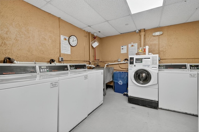 4295 Webster Ave Unit 5J, Bronx, NY 10470 - community laundry room with a textured wall and washer and clothes dryer