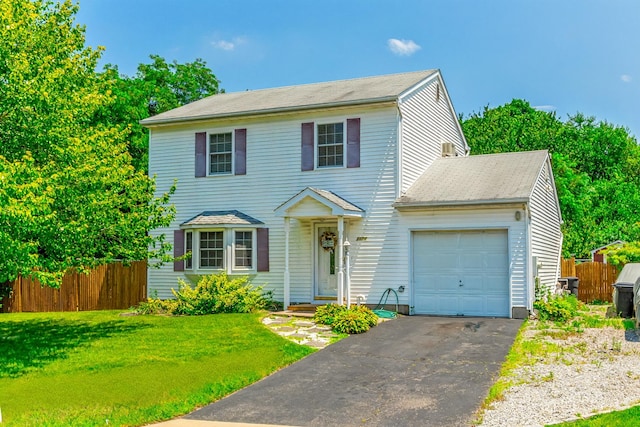 1191 E 3rd Ave, Bay Shore, NY 11706 - view of front facade with an attached garage and driveway