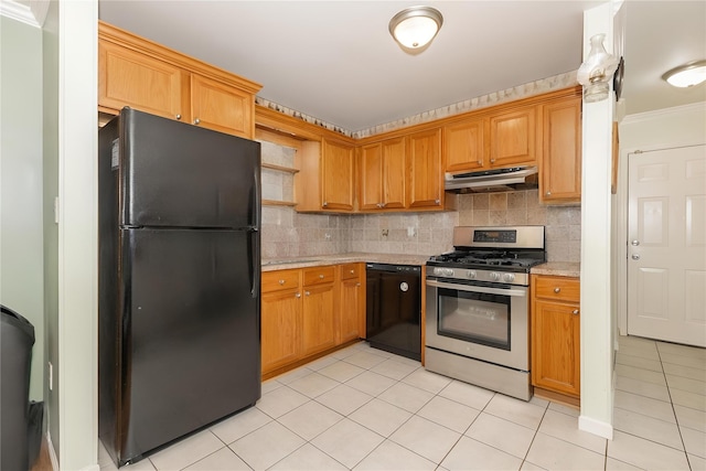 1191 E 3rd Ave, Bay Shore, NY 11706 - kitchen with black appliances, under cabinet range hood, light tile patterned flooring, tasteful backsplash, and crown molding