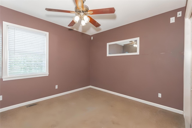 1191 E 3rd Ave, Bay Shore, NY 11706 - carpeted empty room with a ceiling fan and baseboards