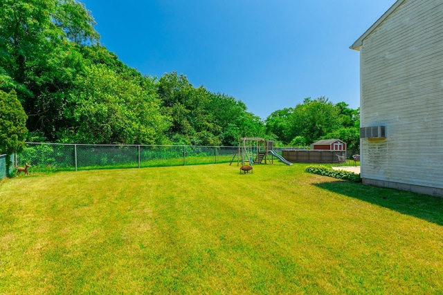 1191 E 3rd Ave, Bay Shore, NY 11706 - fenced backyard featuring a playground