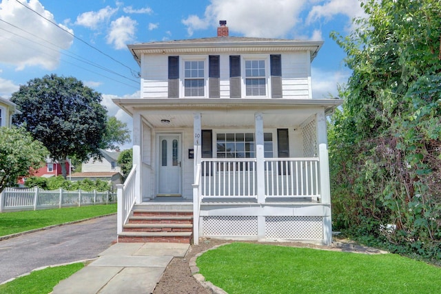 10 Valentine St, Glen Cove, NY 11542 - american foursquare style home with a porch and a chimney