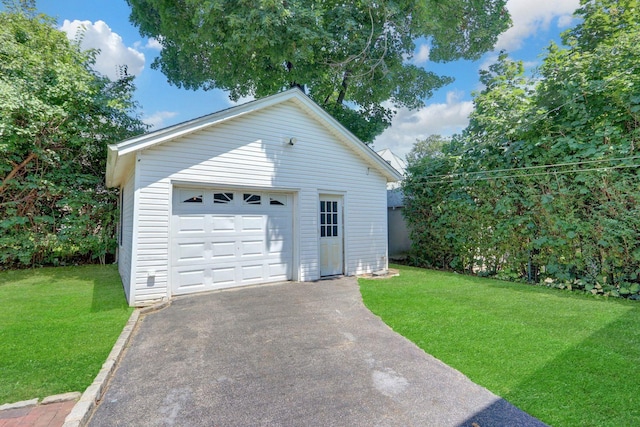 10 Valentine St, Glen Cove, NY 11542 - detached garage featuring asphalt driveway