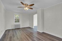 10 Valentine St, Glen Cove, NY 11542 - empty room with a ceiling fan, crown molding, and wood finished floors