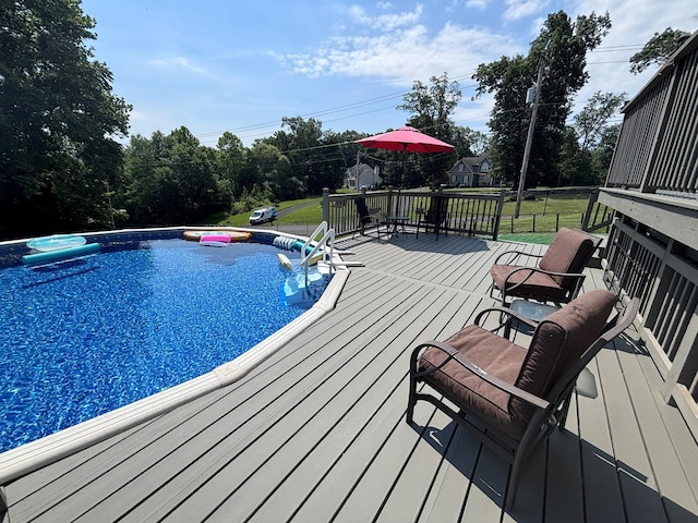 1002 Forest Gln, New Windsor, NY 12553 - view of swimming pool with a deck and a lawn