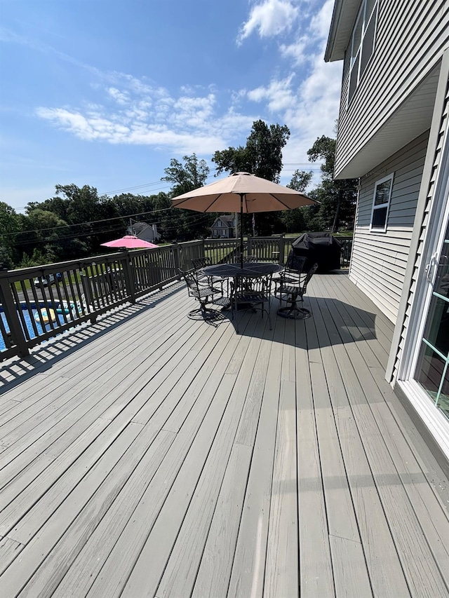 1002 Forest Gln, New Windsor, NY 12553 - wooden deck with outdoor dining area