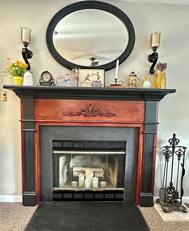 1002 Forest Gln, New Windsor, NY 12553 - detailed view of a glass covered fireplace and carpet flooring